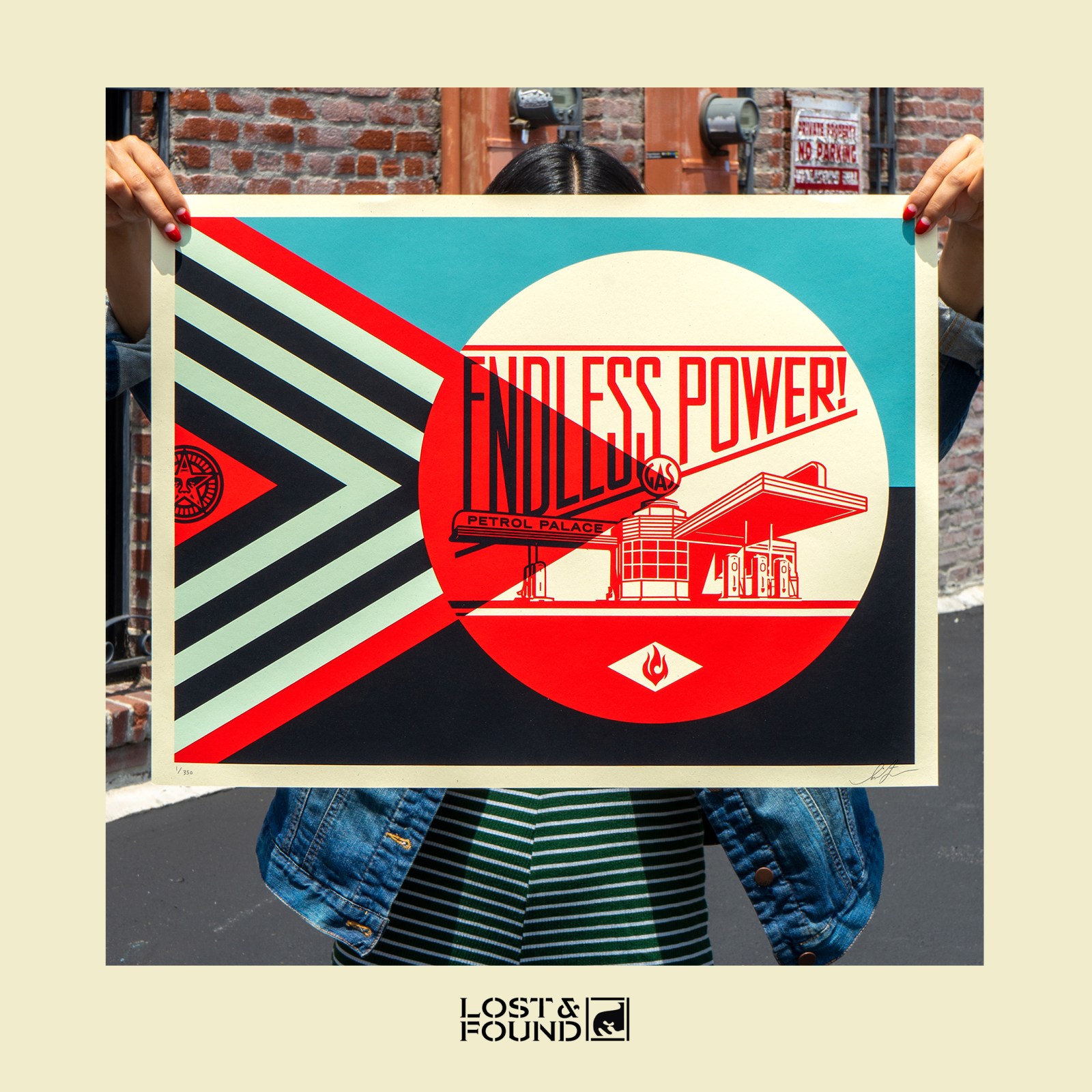 Person holding a screen print; text: Endless Power!, Petrol Palace.